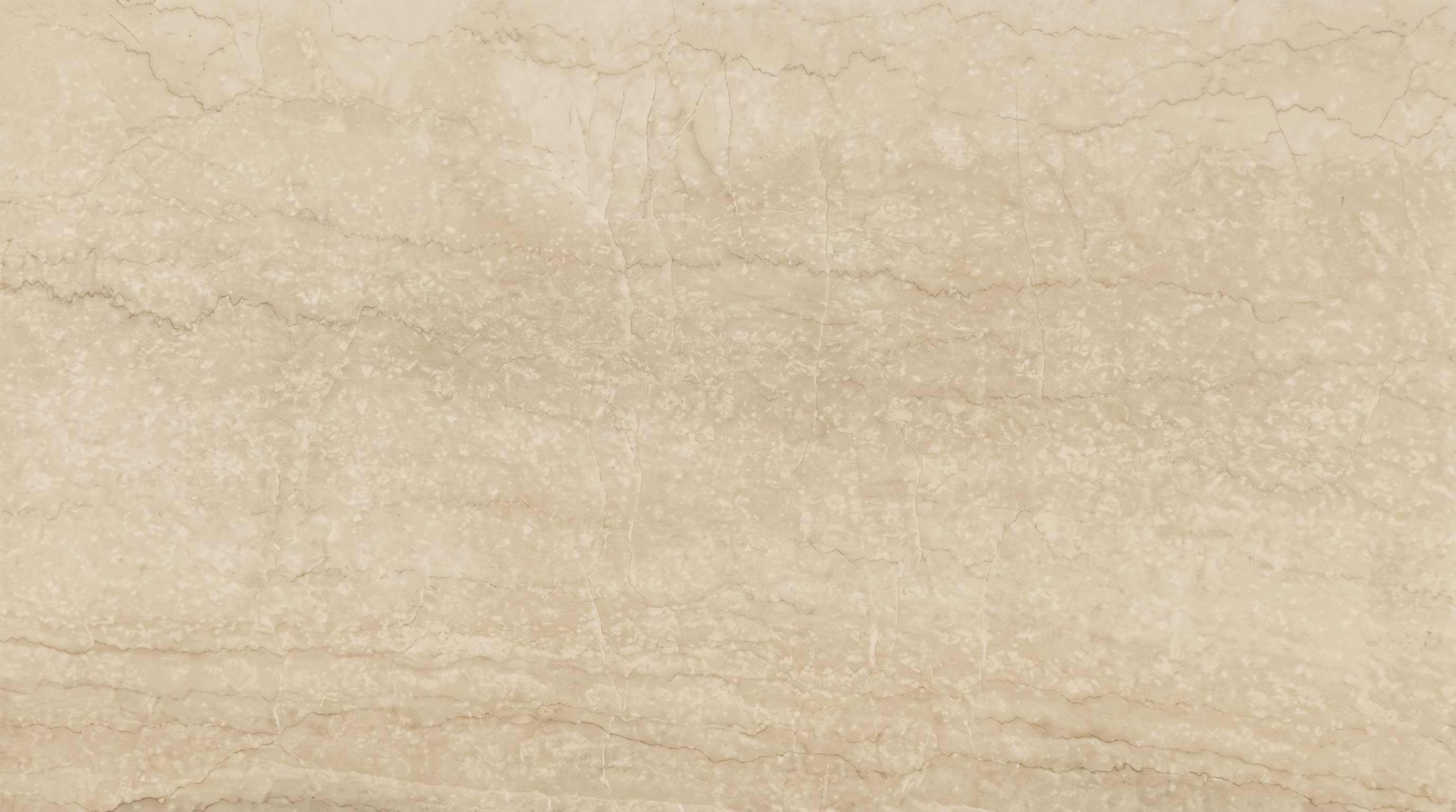 Premium Botticino Imported Marble featuring a creamy beige background adorned with delicate ivory veins. High-quality polished slab supplied wholesale in Kishangarh.
