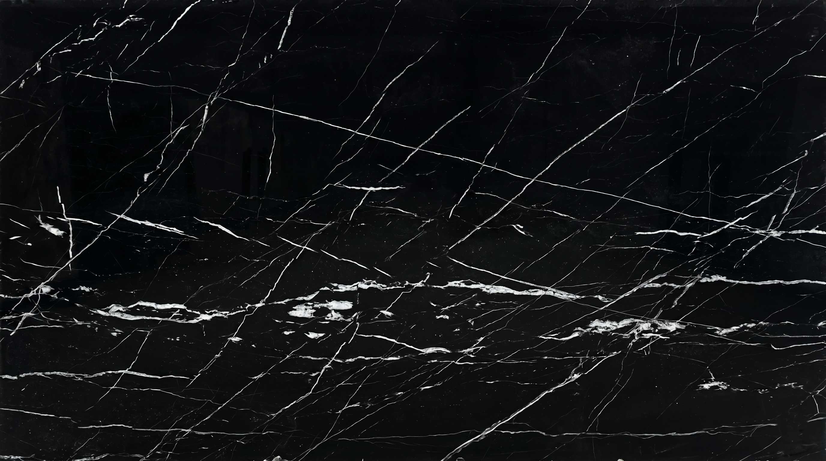 Premium Nero Marquina Imported Marble featuring a legendary black canvas slashed by brilliant striking white veins. High-quality polished slab supplied wholesale in Kishangarh.