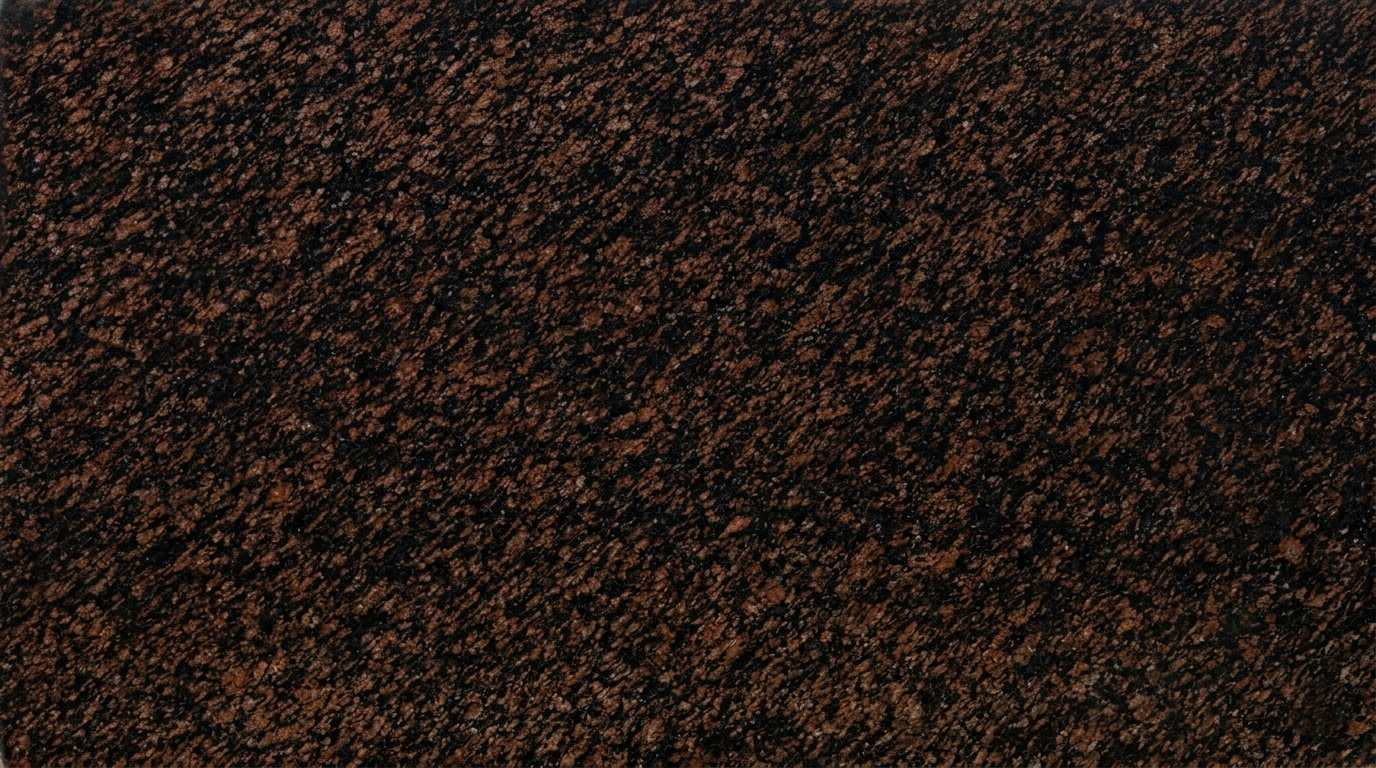 Premium Asian Top Indian Granite featuring a bold, deep earthy brown and grey surface with intricate speckles. High-quality polished slab supplied wholesale in Kishangarh.