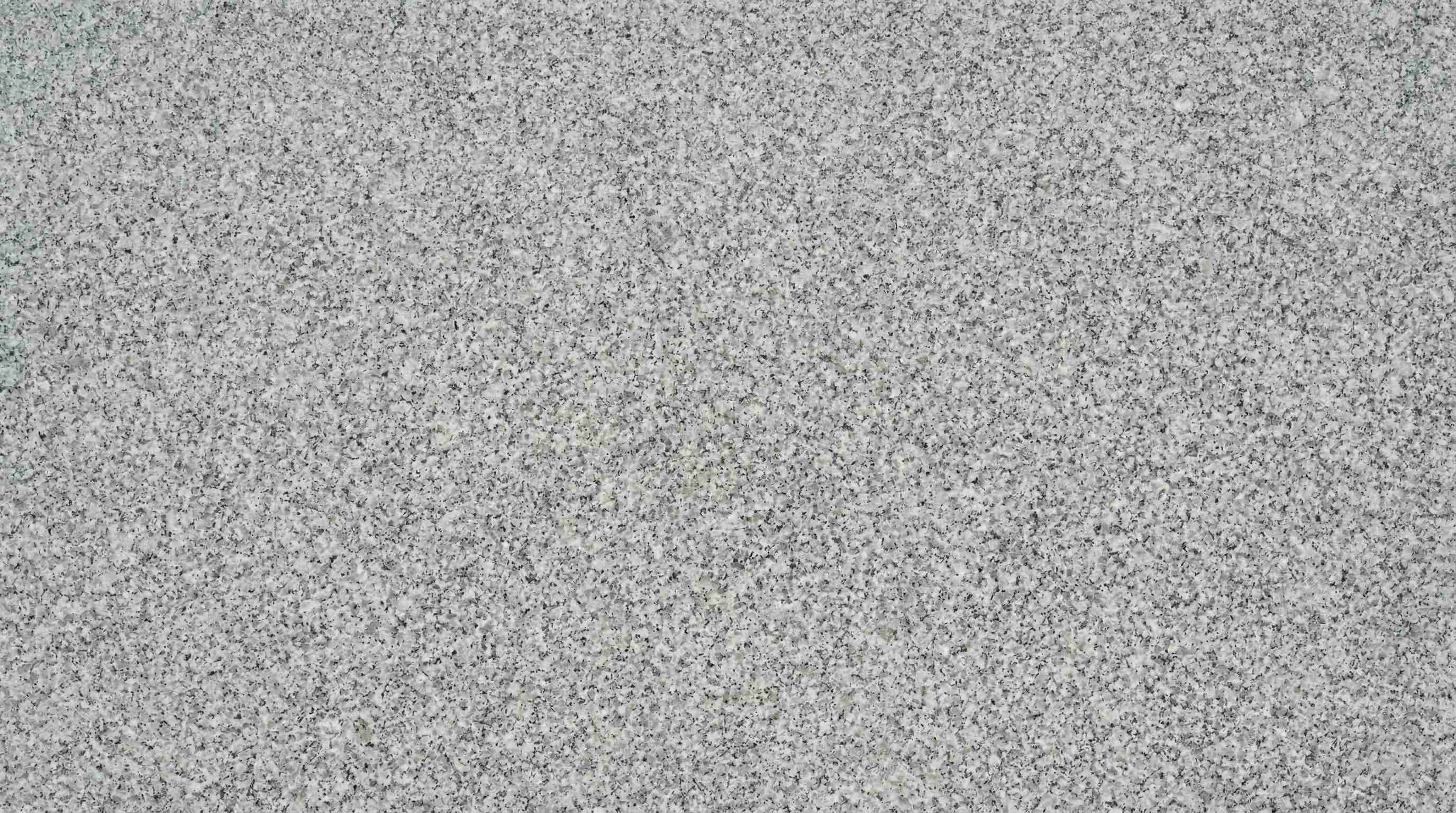 Premium S White Indian Granite featuring a refined, architectural clean white canvas. High-quality polished slab supplied wholesale in Kishangarh.